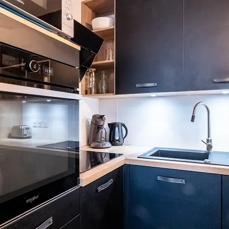 L'elegance : Grande Chambre/stationnement *