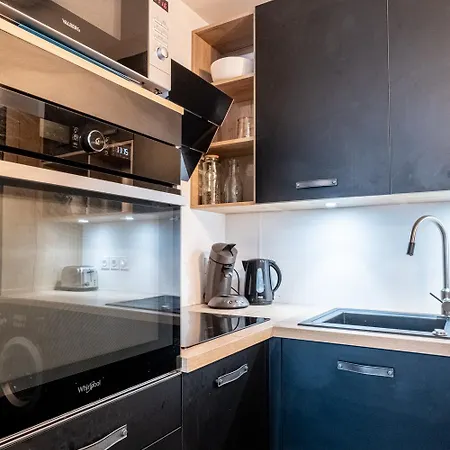 L'elegance : Grande Chambre/stationnement *